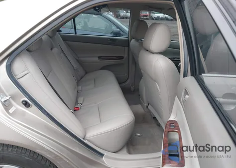 2003 Toyota Camry Le z USA, uszkodzony, nr VIN JTDBE32KX30178027